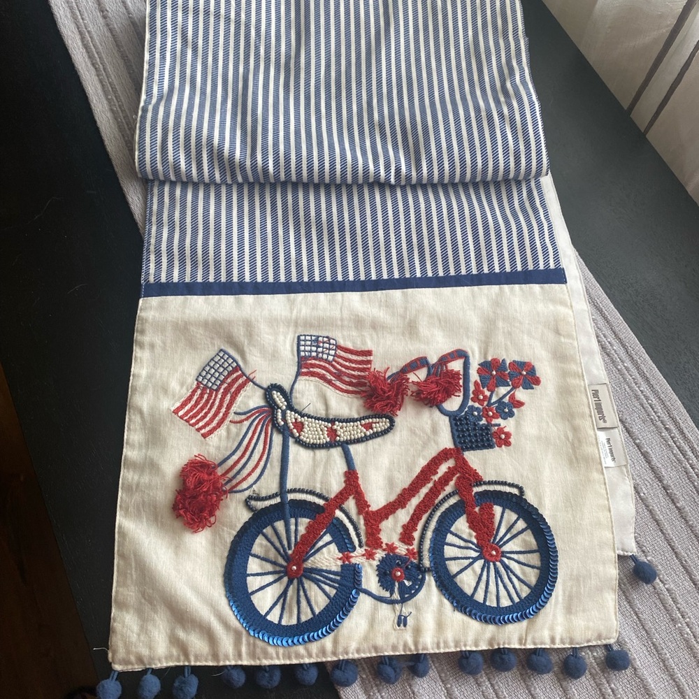 Pier 1 patriotic 4th of July table runner.  R Re Ed, white, and blue.